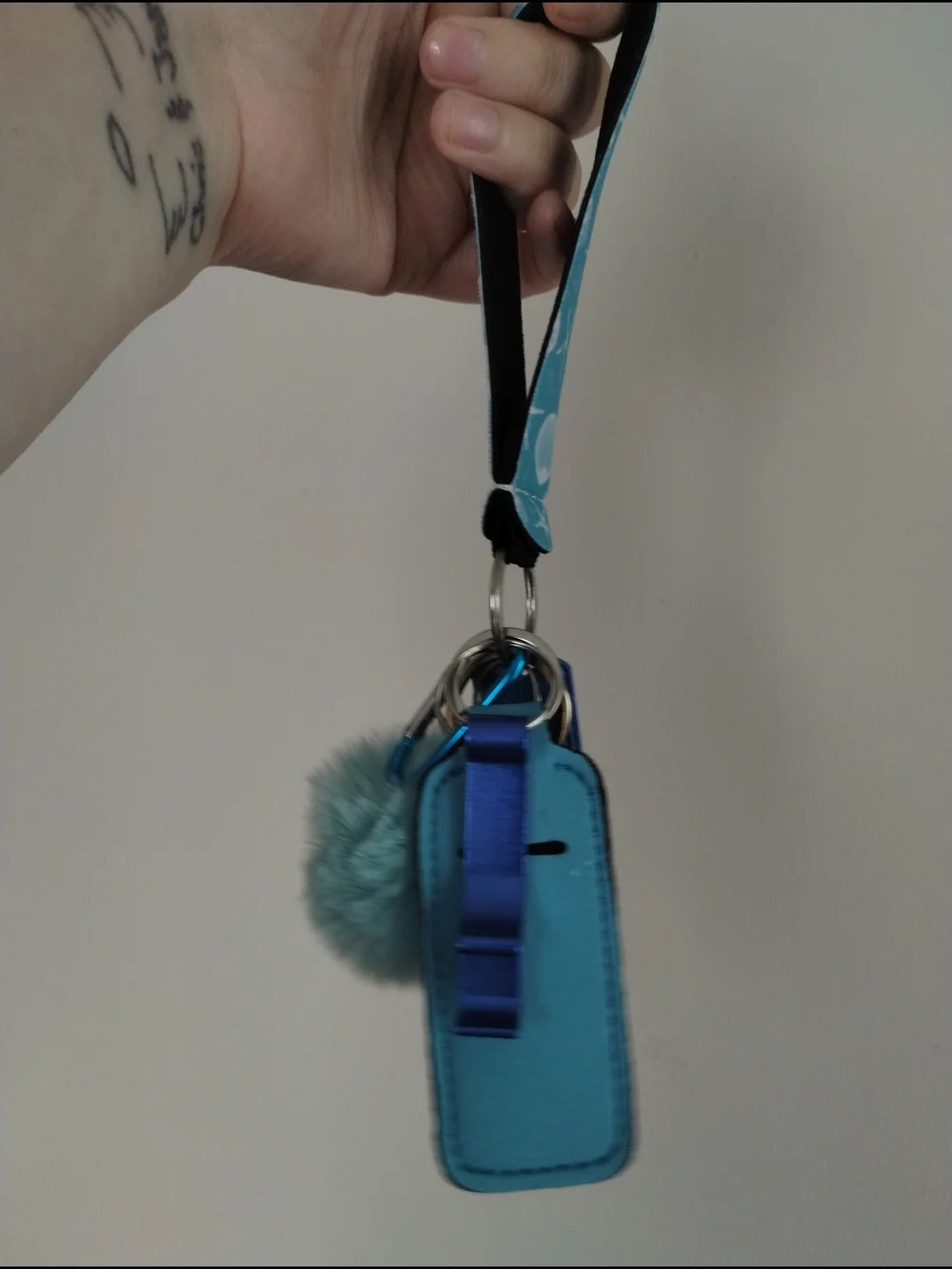 Sea Shell Print Wristlet Keychain with Aqua Faux Fur Pom